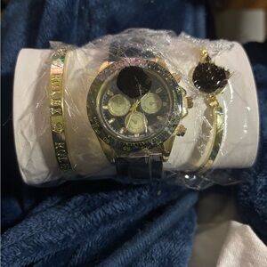 Gold and Black Chronograph Watch with Matching Gold Bracelets